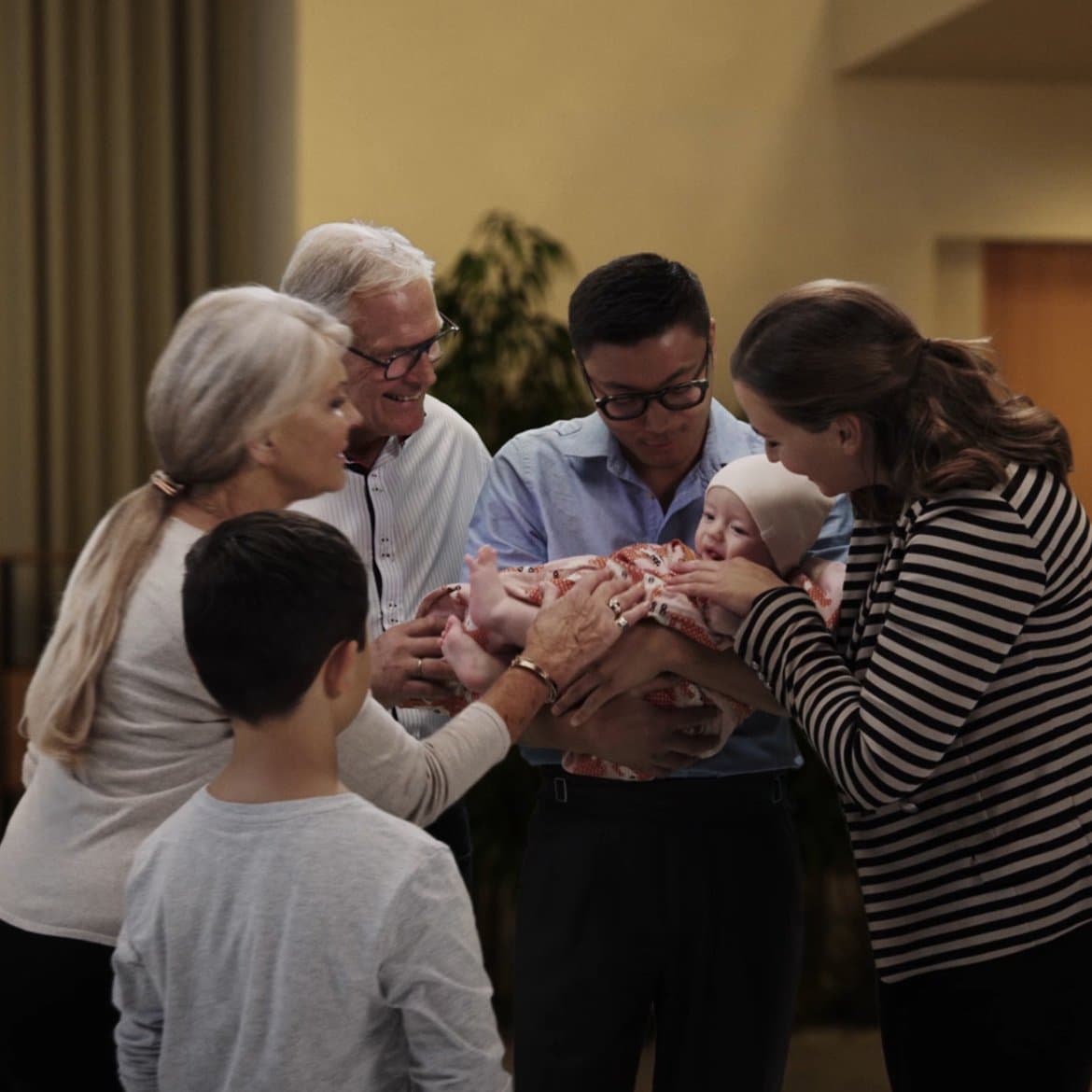 Multi-generational family with small baby